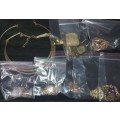 A VINTAGE JOBLOT GOLD PLATED NECKLACES AND PENDANTS SOLD AS IS