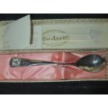 AN ANTIQUE GIFT  SPOON BONAPATITE SOLD AS IS