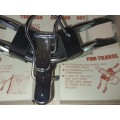 A VINTAGE TRAVELERS TROUSER HANGER IN ITS ORIGINAL BOX SOLD AS IS