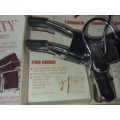A VINTAGE TRAVELERS TROUSER HANGER IN ITS ORIGINAL BOX SOLD AS IS
