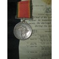 A COLLECTION OF MILITARIA BADGES WITH PAPERWORK SOLD AS IS