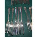 A VINTAGE COLLECTION OF DESERT FORKS SOLD AS IS