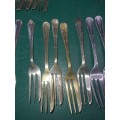 A VINTAGE COLLECTION OF DESERT FORKS SOLD AS IS