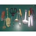 A COLLECTION OF MIXED CUTLERY SOLD AS IS
