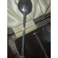 AN ANTIQUE EPNS TEASPOON SET IN ITS ORIGINAL CASE SOLD AS IS