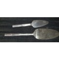 TWO STAINLESS STEEL CAKE LIFTERS SOLD AS IS