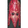 A TRIBAL ETHNIC RED PAINTED WOODEN MASK ORIGINAL SOLD AS IS