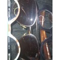 A COLLECTION OF QUALITY BRANDED SUNGLASSES SOLD AS IS