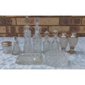 A VINTAGE COLLECTORS CRYSTAL GLASS BOTTLES AND CONTAINERS