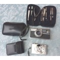 A VINTAGE COLLECTORS JOBLOT TWO CAMERAS AND A PEDICURE SET SOLD AS IS NOT TESTED
