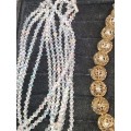 A VINTAGE COLLECTION OF HIGH-END COSTUME NECKLACE SETS
