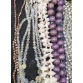 A VINTAGE COLLECTION JOBLOT OF BEADED COSTUME NECKLACES SOLD AS IS