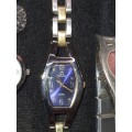 A fancy collection of Tamato womans quartz watches sold as is not tested