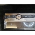 A men`s swatch wristwatch working in good condition sold as is