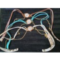 A WOMANS COSTUME SET OF 3 NECKLACES QUARTZ WATCHES SOLD AS IS NOT TESTED