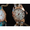 A WOMANS COSTUME SET OF 3 NECKLACES QUARTZ WATCHES SOLD AS IS NOT TESTED