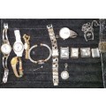 A COLLECTION OF WOMANS WATCHES SOLD AS IS NOT TESTED