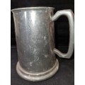 A VINTAGE SILVER-PLATED BEER MUG SOLD AS IS