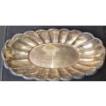 AN OVAL VINTAGE SILVER PLATED SERVING TRAY SOLD AS IS