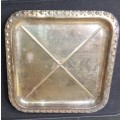 A VINTAGE SILVER-PLATED SERVING TRAY SOLD AS IS