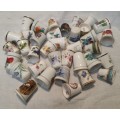 A COLLECTION OF VINTAGE PORCELLAN COLLECTORS SEWING TIMBLES SOLD AS IS