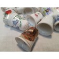 A COLLECTION OF VINTAGE PORCELLAN COLLECTORS SEWING TIMBLES SOLD AS IS