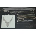 A DISCERNING LADIES COLLECTION OF VINTAGE NECKLACES SOLD AS IS