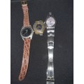 A collection Swatch wrist watches sold as is not tested