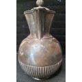 AN ANTIQUE SILVER-PLATED TEA JUG IN GOOD CONDITION ORIGINAL SOLD AS IS