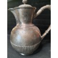 AN ANTIQUE SILVER-PLATED TEA JUG IN GOOD CONDITION ORIGINAL SOLD AS IS
