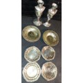 A collection of vintage utensils and a pair of silver-plated candle holders in good condition sold a