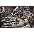 A BULK VINTAGE COLLECTION OF RARE QUALITY BANGLES AND BRACELETS SOLD AS IS