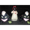 A collection of American folk art ceramic figurines in good condition sold as is