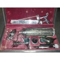 AN ANTIQUE DOCTORS MEDICAL TOOL SET SOLD AS IS