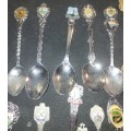 A JOBLOT VINTAGE COLLECTION MEMORABILIA SPOONS SOLD AS IS