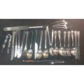 A VINTAGE JOBLOT STAINLESS STEEL CUTLERY SOLD AS IS