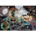 A BULK VINTAGE JOBLOT BRACELETS AND RARE BANGLES  OF QUAITY SOLD AS IS