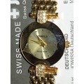 A RARE JOWISSA SWISS GOLDPLATED WITH CRYSTALS WOMANS WATCH