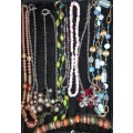 A VINTAGE JOBLOT COSTUME NECKLACES SOLD AS IS