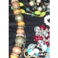 A VINTAGE JOBLOT COSTUME NECKLACES SOLD AS IS