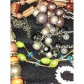 A VINTAGE JOBLOT COSTUME NECKLACES SOLD AS IS