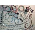 AN ANTIQUE JOBLOT BANGLES AND BRACELETS SOLD AS IS