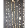 A BULK VINTAGE JOBLOT COSTUME SILVER PLATED NECKLACES AND PENDANTS