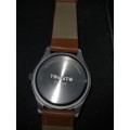 A UNISEX TAMATO WRISTWATCH SOLD AS IS NOT TESTED