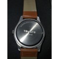 A UNISEX TAMATO WRISTWATCH SOLD AS IS NOT TESTED