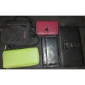 A DISCERNING LADY`S COLLECTION OF WALLETS AND PURSES SOLD AS IS
