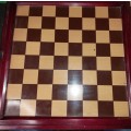 A VINTAGE CHESS BOARD AND STORAGE COMPARTMENT WITH ALL THE PIECES COMPLETE SET PIECES ARE CERAMIC