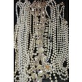 A BULK VINTAGE AND ANTIQUE COSTUME IMITATION PEARL NECKLACES SOLD AS IS