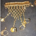 A COLLECTION OF ASIAN BRIDAL JEWELRY SOLD AS IS