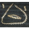 A VINTAGE ITALIAN DESIGN GOLD PLATED AND SILVER NECKLACE SET WITH MATCHING BRACELET AND EARRINGS